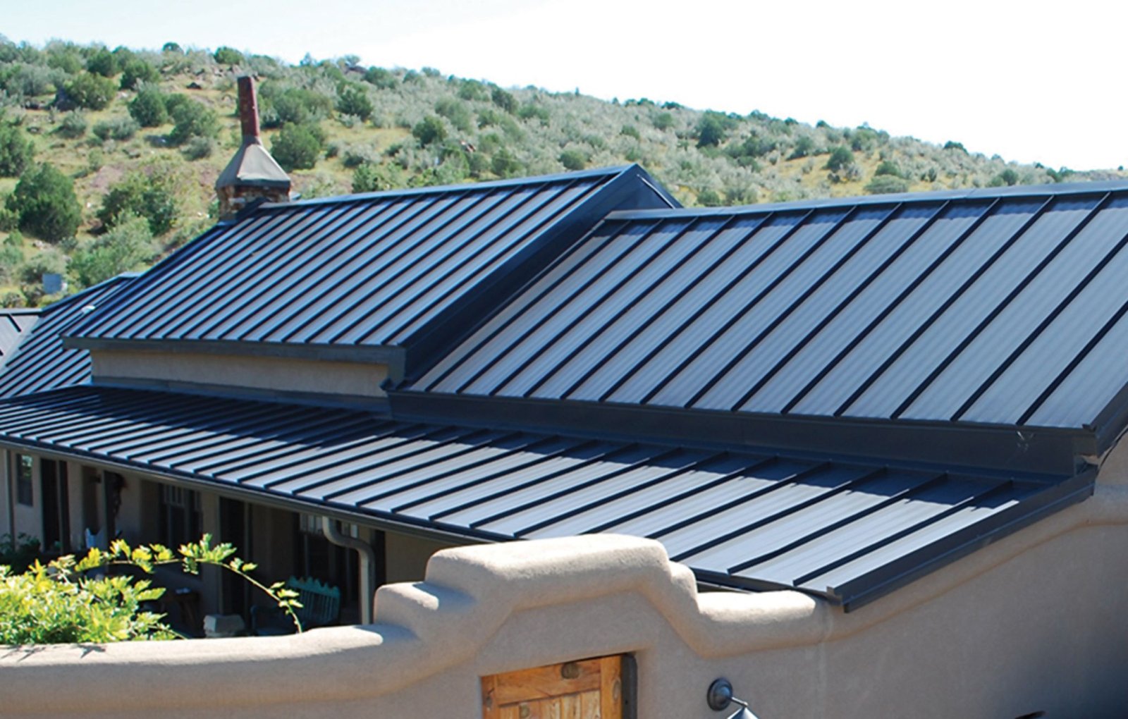 Metal Roof vs Shingle Roof Cost: Reroofing & Durability